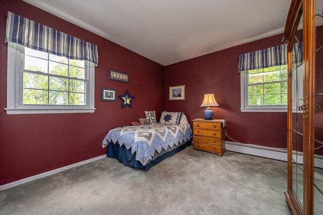 26 Strathmore Dr, New City, NY 10956 - carpeted bedroom featuring baseboards and multiple windows