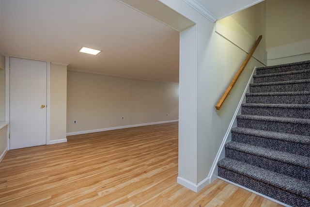 26 Strathmore Dr, New City, NY 10956 - staircase with crown molding, baseboards, and wood finished floors