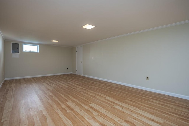 26 Strathmore Dr, New City, NY 10956 - empty room featuring crown molding, baseboards, electric panel, and light wood-type flooring