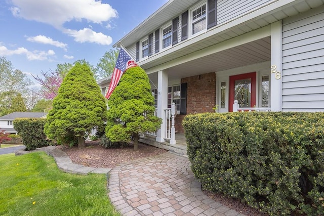 26 Strathmore Dr, New City, NY 10956 - entrance to property featuring brick siding and covered porch