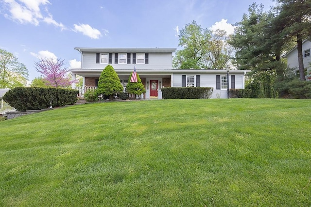 26 Strathmore Dr, New City, NY 10956 - traditional home featuring a porch and a front yard
