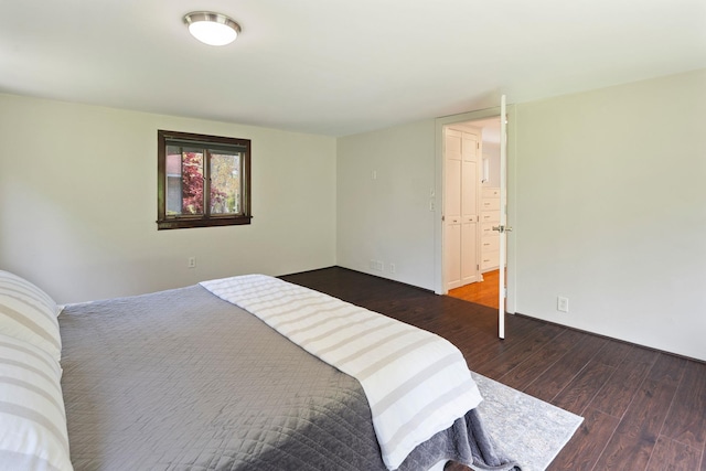 bedroom with wood finished floors