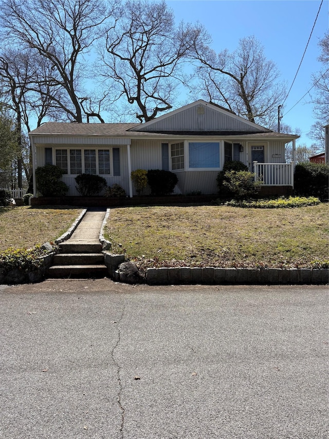 8 Dee Pl, Huntington Station, NY 11746 - view of front of property featuring a front yard