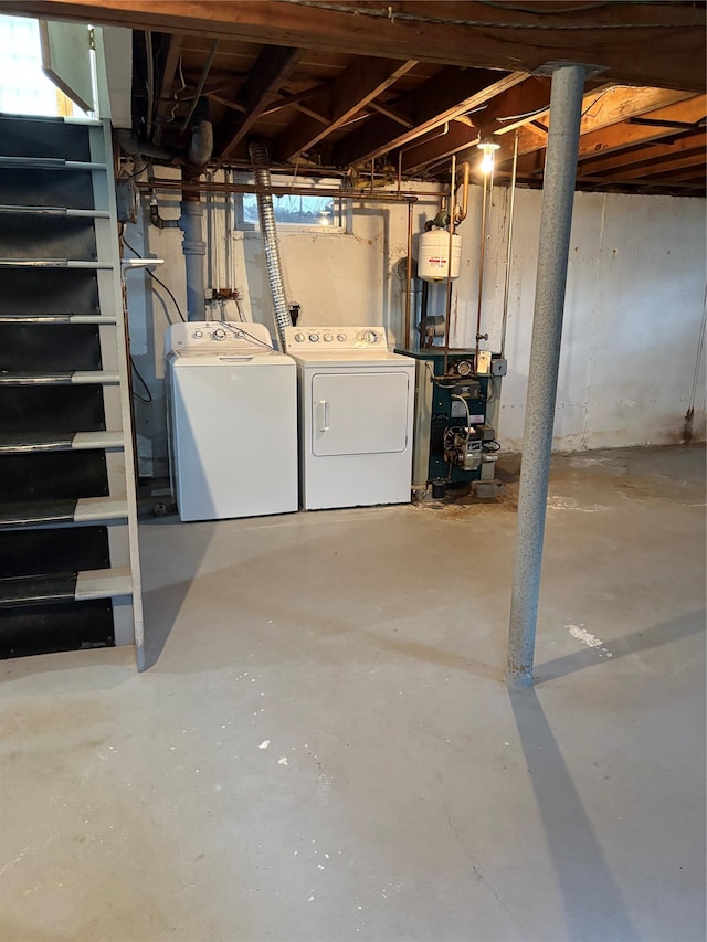 8 Dee Pl, Huntington Station, NY 11746 - below grade area with washing machine and clothes dryer and a heating unit
