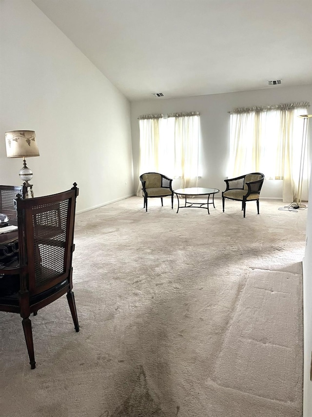 12 Sophia Dr, Middle Island, NY 11953 - living area featuring carpet floors and lofted ceiling