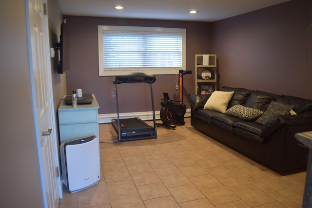 workout area featuring light tile patterned flooring and recessed lighting
