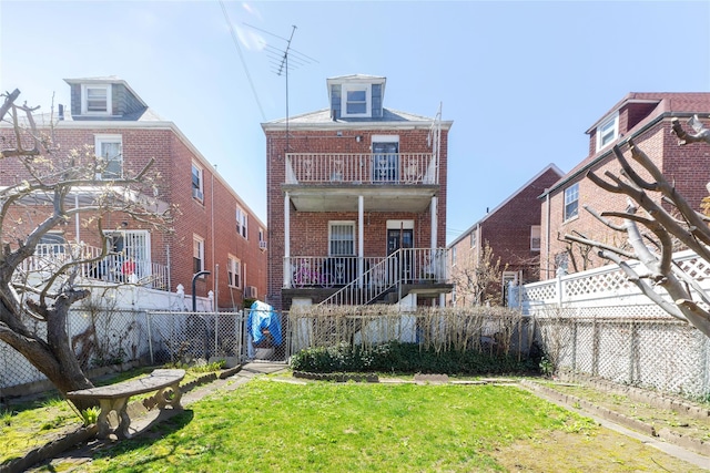 2162 Haight Ave, Bronx, NY 10461 - back of property featuring a gate, brick siding, fence private yard, a balcony, and a yard