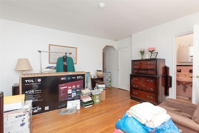 2162 Haight Ave, Bronx, NY 10461 - office area with arched walkways and wood finished floors