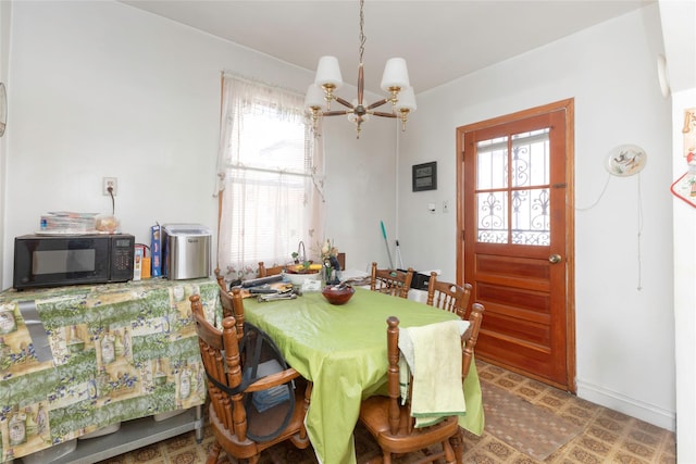 2162 Haight Ave, Bronx, NY 10461 - dining room featuring a notable chandelier