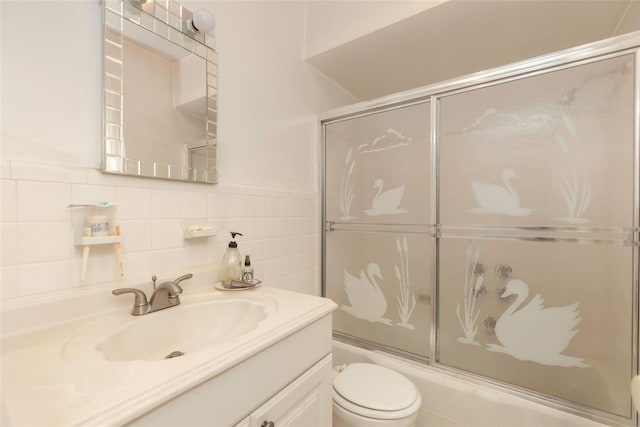 2162 Haight Ave, Bronx, NY 10461 - bathroom featuring shower / bath combination with glass door, toilet, and vanity