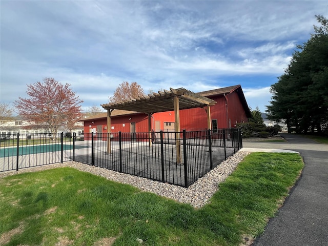 282 Tamerisk Ln, New Windsor, NY 12553 - view of swimming pool featuring fence and a pergola