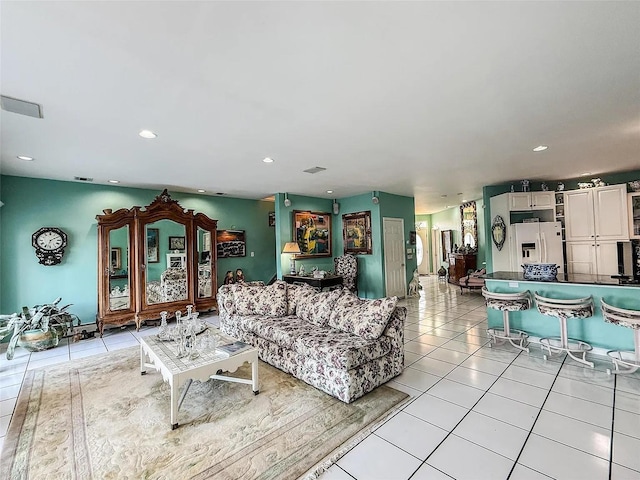 282 Tamerisk Ln, New Windsor, NY 12553 - living area with light tile patterned floors and recessed lighting