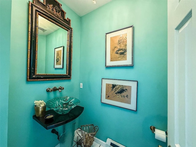 282 Tamerisk Ln, New Windsor, NY 12553 - bathroom featuring baseboards