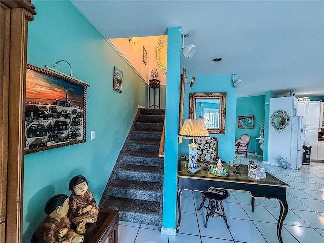 282 Tamerisk Ln, New Windsor, NY 12553 - stairway featuring tile patterned floors