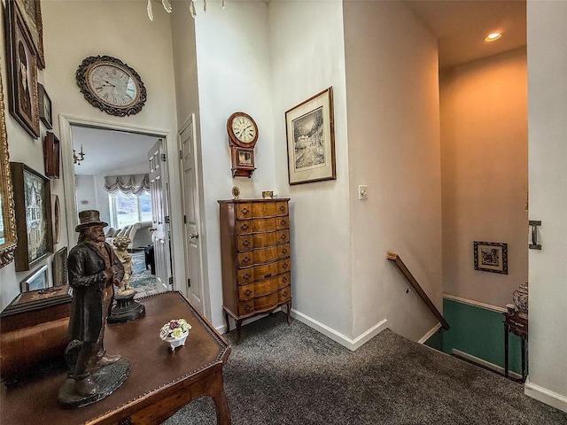 282 Tamerisk Ln, New Windsor, NY 12553 - corridor with an upstairs landing, baseboards, carpet flooring, and a towering ceiling