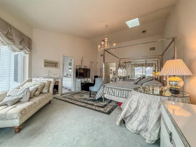 282 Tamerisk Ln, New Windsor, NY 12553 - bedroom featuring a chandelier, carpet floors, a skylight, access to outside, and lofted ceiling