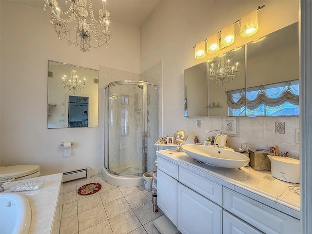 282 Tamerisk Ln, New Windsor, NY 12553 - bathroom with a chandelier, a baseboard heating unit, and a shower stall