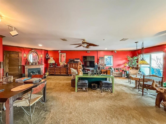 282 Tamerisk Ln, New Windsor, NY 12553 - dining room featuring carpet floors, a glass covered fireplace, a ceiling fan, and recessed lighting