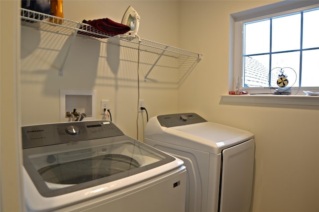 laundry room featuring laundry area and washing machine and dryer