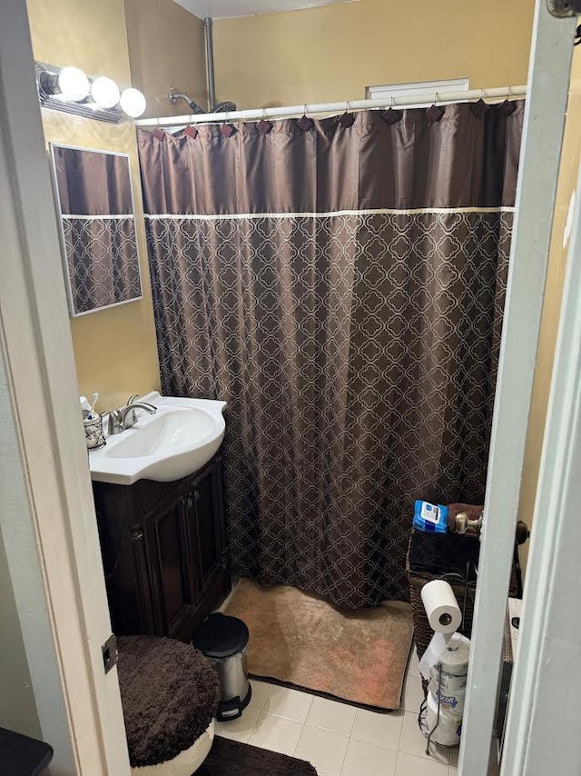 7 Everit Ave Unit B11, Hewlett, NY 11557 - full bath with vanity, tile patterned floors, and curtained shower