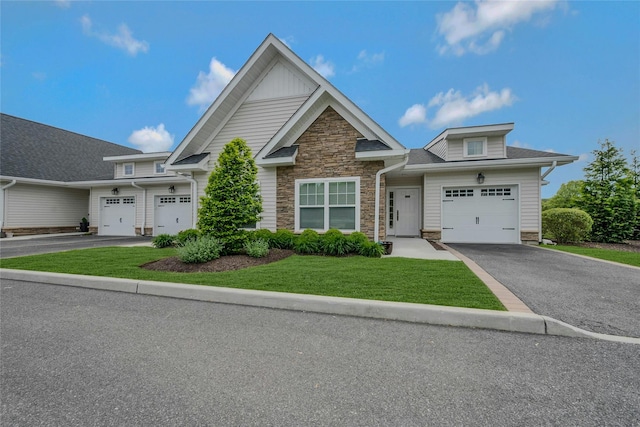 2300 Fox Hill Dr Unit 1101, Baiting Hollow, NY 11933 - view of front facade featuring driveway, stone siding, and a front yard
