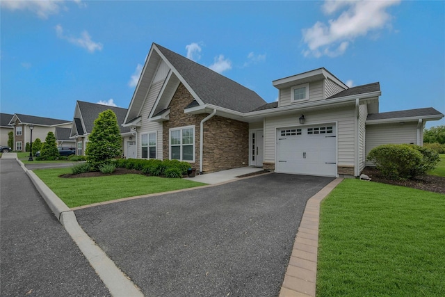 2300 Fox Hill Dr Unit 1101, Baiting Hollow, NY 11933 - view of front of home featuring an attached garage, a front lawn, asphalt driveway, stone siding, and a shingled roof