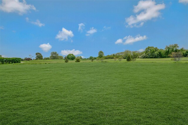 2300 Fox Hill Dr Unit 1101, Baiting Hollow, NY 11933 - view of green lawn with a view of rural / pastoral area