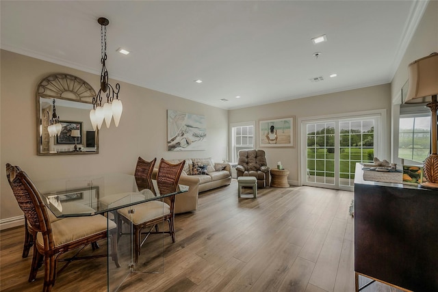 2300 Fox Hill Dr Unit 1101, Baiting Hollow, NY 11933 - dining area featuring ornamental molding, wood finished floors, and recessed lighting