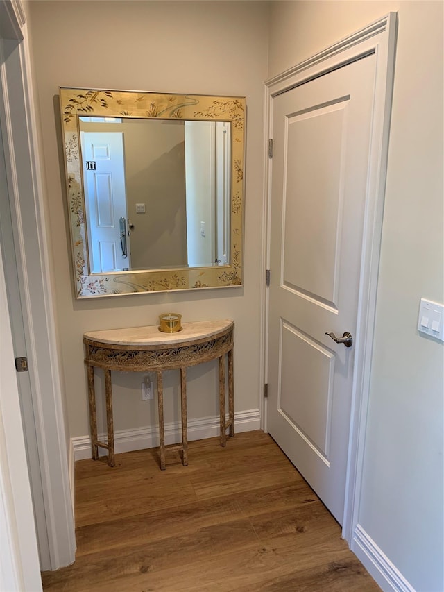 2300 Fox Hill Dr Unit 1101, Baiting Hollow, NY 11933 - bathroom featuring wood finished floors and baseboards
