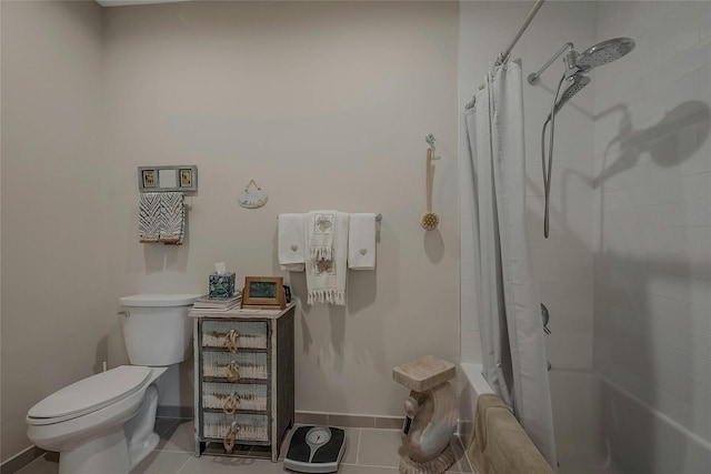 2300 Fox Hill Dr Unit 1101, Baiting Hollow, NY 11933 - full bath featuring shower / tub combo with curtain, toilet, tile patterned floors, and baseboards