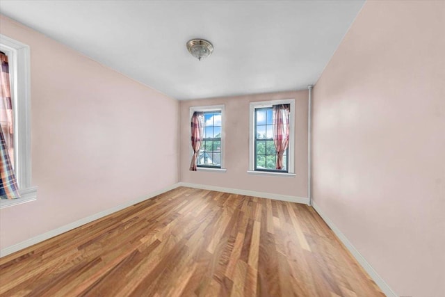 100 Parkway Rd Unit 4C, Bronxville, NY 10708 - unfurnished room with baseboards and light wood-style flooring