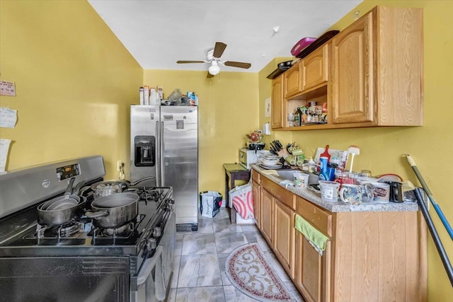 100 Parkway Rd Unit 4C, Bronxville, NY 10708 - kitchen with gas range oven, stainless steel fridge, a ceiling fan, light countertops, and light tile patterned floors