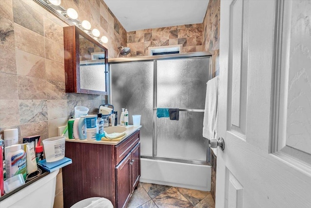 100 Parkway Rd Unit 4C, Bronxville, NY 10708 - bathroom featuring vanity and shower / bath combination with glass door