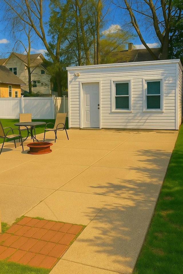 view of patio / terrace featuring fence