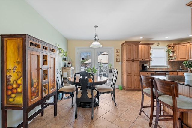 dining area with recessed lighting and light tile patterned floors
