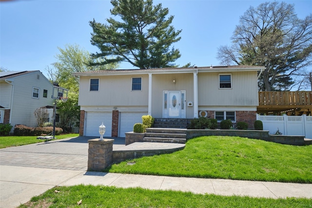 1 Neubrech Ct, Jericho, NY 11753 - raised ranch with a garage, brick siding, decorative driveway, fence, and a front lawn