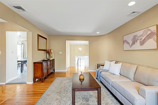 1 Neubrech Ct, Jericho, NY 11753 - living area with baseboards, recessed lighting, light wood-style flooring, and visible vents