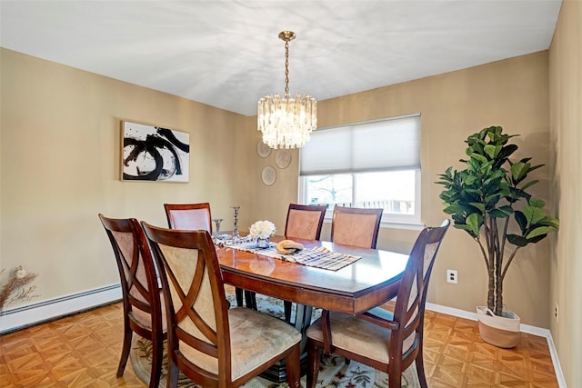 1 Neubrech Ct, Jericho, NY 11753 - dining area featuring an inviting chandelier, baseboards, and a baseboard heating unit