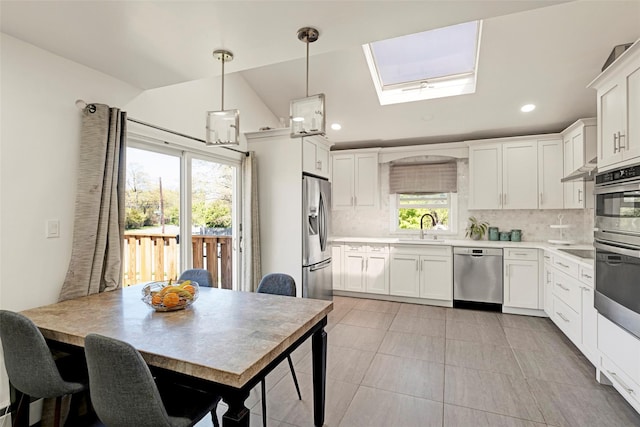 1 Neubrech Ct, Jericho, NY 11753 - kitchen with a sink, light countertops, tasteful backsplash, and stainless steel appliances