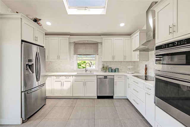 1 Neubrech Ct, Jericho, NY 11753 - kitchen featuring a sink, stainless steel appliances, recessed lighting, and wall chimney exhaust hood