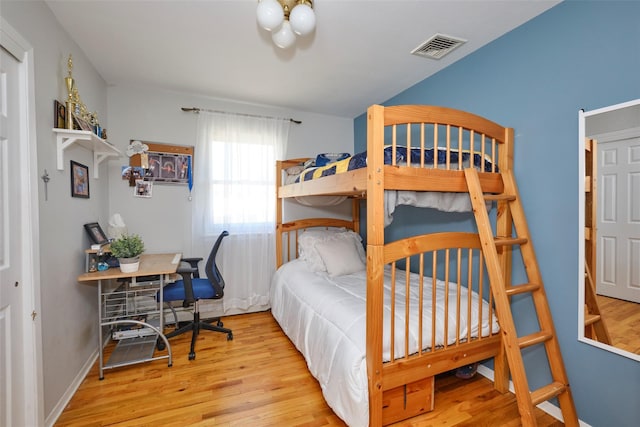 1 Neubrech Ct, Jericho, NY 11753 - bedroom featuring visible vents, baseboards, and wood finished floors