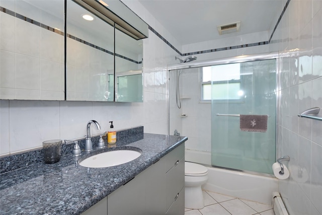 1 Neubrech Ct, Jericho, NY 11753 - bathroom featuring vanity, tile patterned flooring, shower / bath combination with glass door, toilet, and a baseboard heating unit