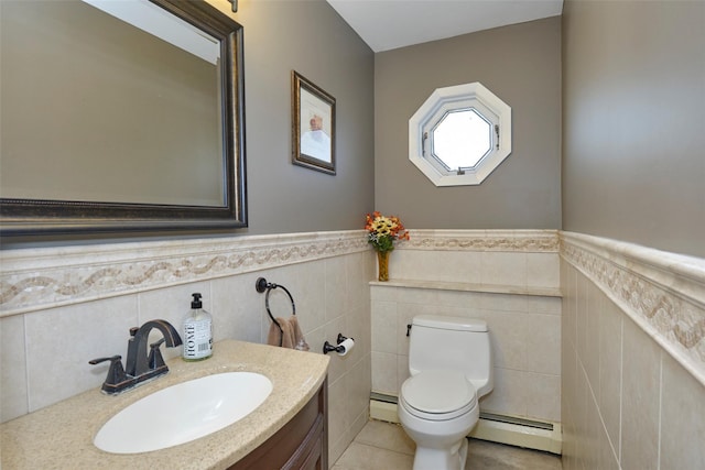 1 Neubrech Ct, Jericho, NY 11753 - bathroom featuring vanity, baseboard heating, a wainscoted wall, and toilet