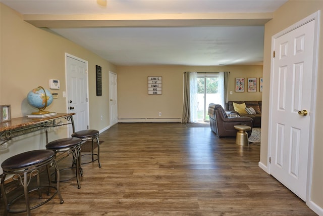 1 Neubrech Ct, Jericho, NY 11753 - interior space with baseboards, dark wood finished floors, and baseboard heating
