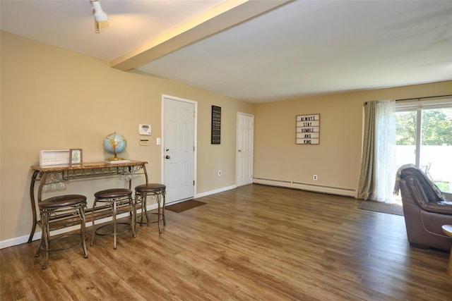 1 Neubrech Ct, Jericho, NY 11753 - interior space featuring baseboards, baseboard heating, and wood finished floors