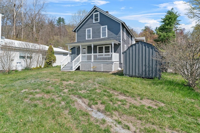 rear view of property with a porch, a storage unit, an outdoor structure, and a yard