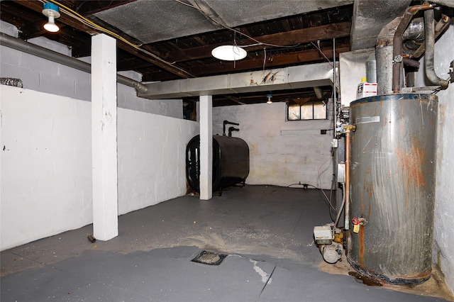 129 Locust Dr, Mastic Beach, NY 11951 - unfinished basement with oil tank and gas water heater