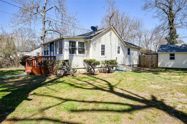 129 Locust Dr, Mastic Beach, NY 11951 - view of side of home with a deck