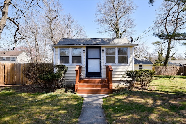 129 Locust Dr, Mastic Beach, NY 11951 - view of front of home with roof with shingles