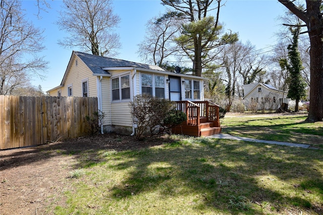 129 Locust Dr, Mastic Beach, NY 11951 - view of front facade featuring roof with shingles